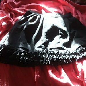 Junior Girls cute lace trim black skirt.